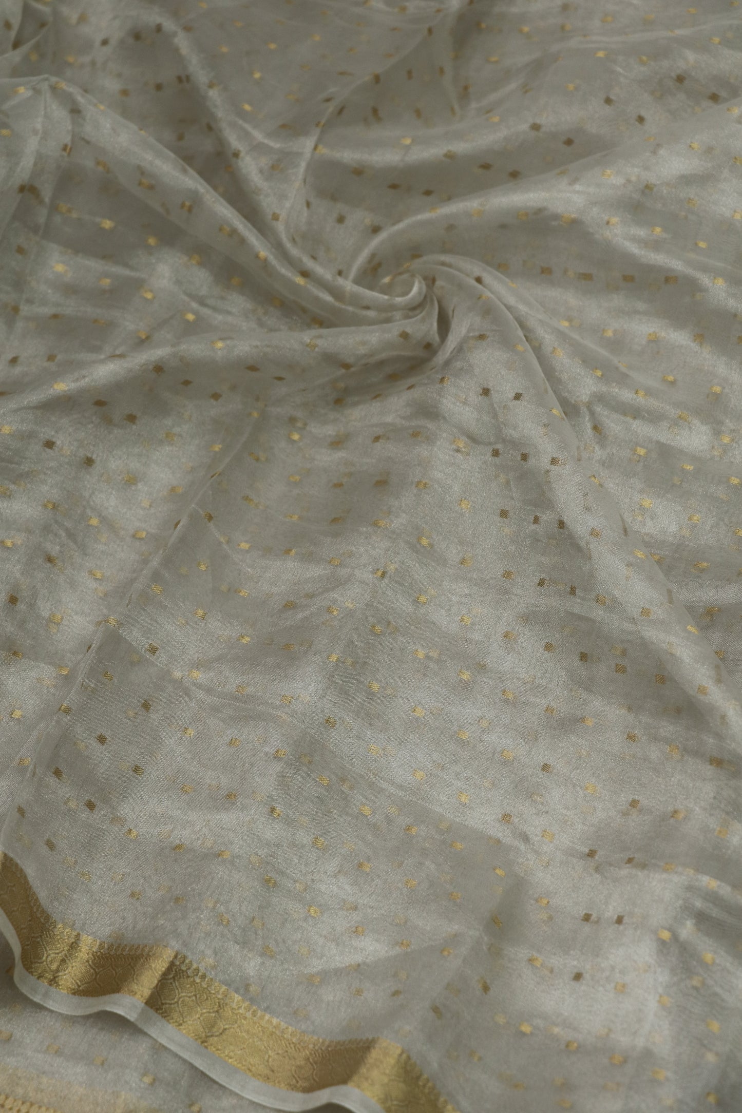 Pure Tissue With Polka Dots Woven & A Small Intricate Border Fabric