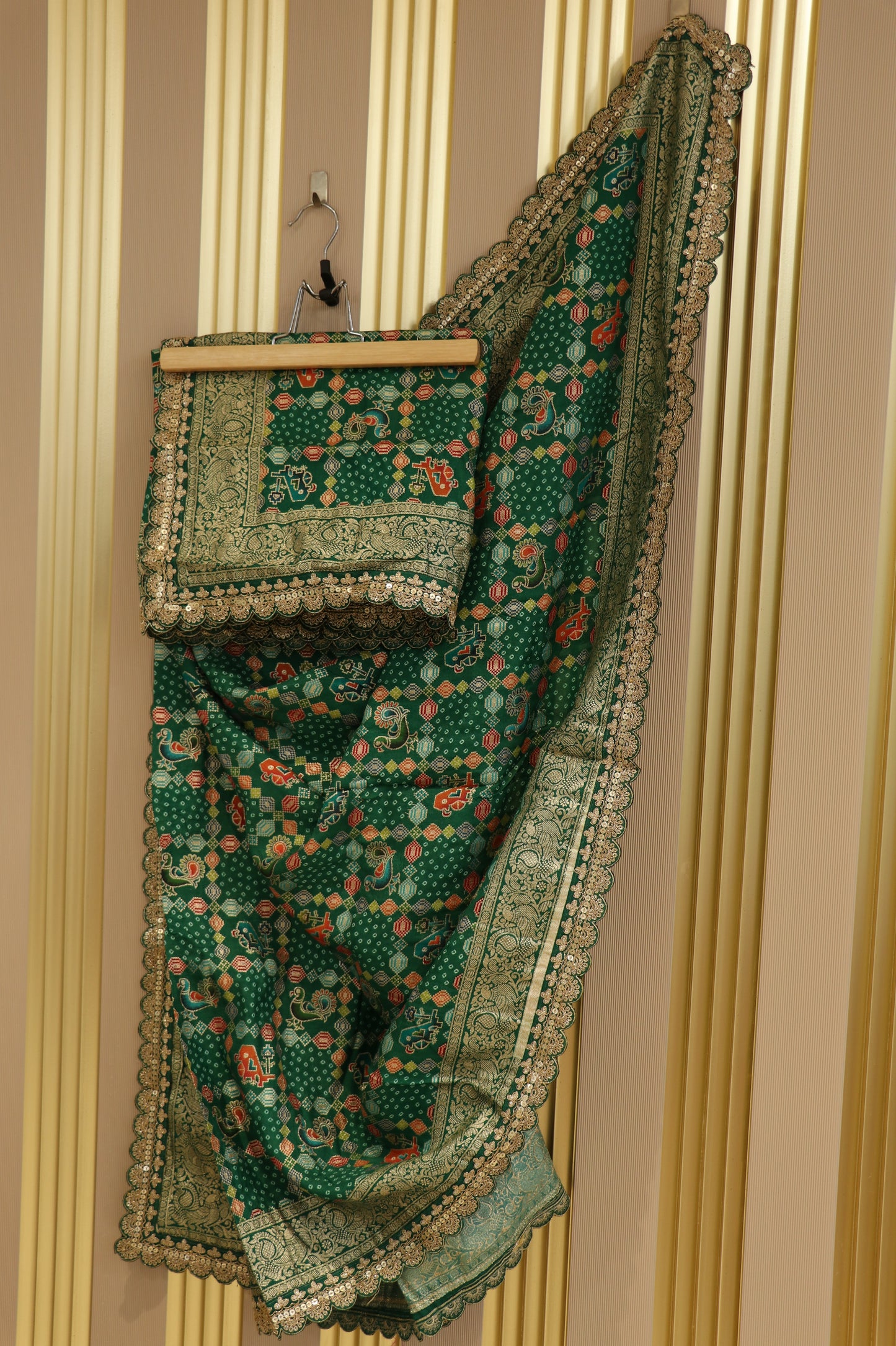 Dola silk semi patola banarasi woven with cutwork border.