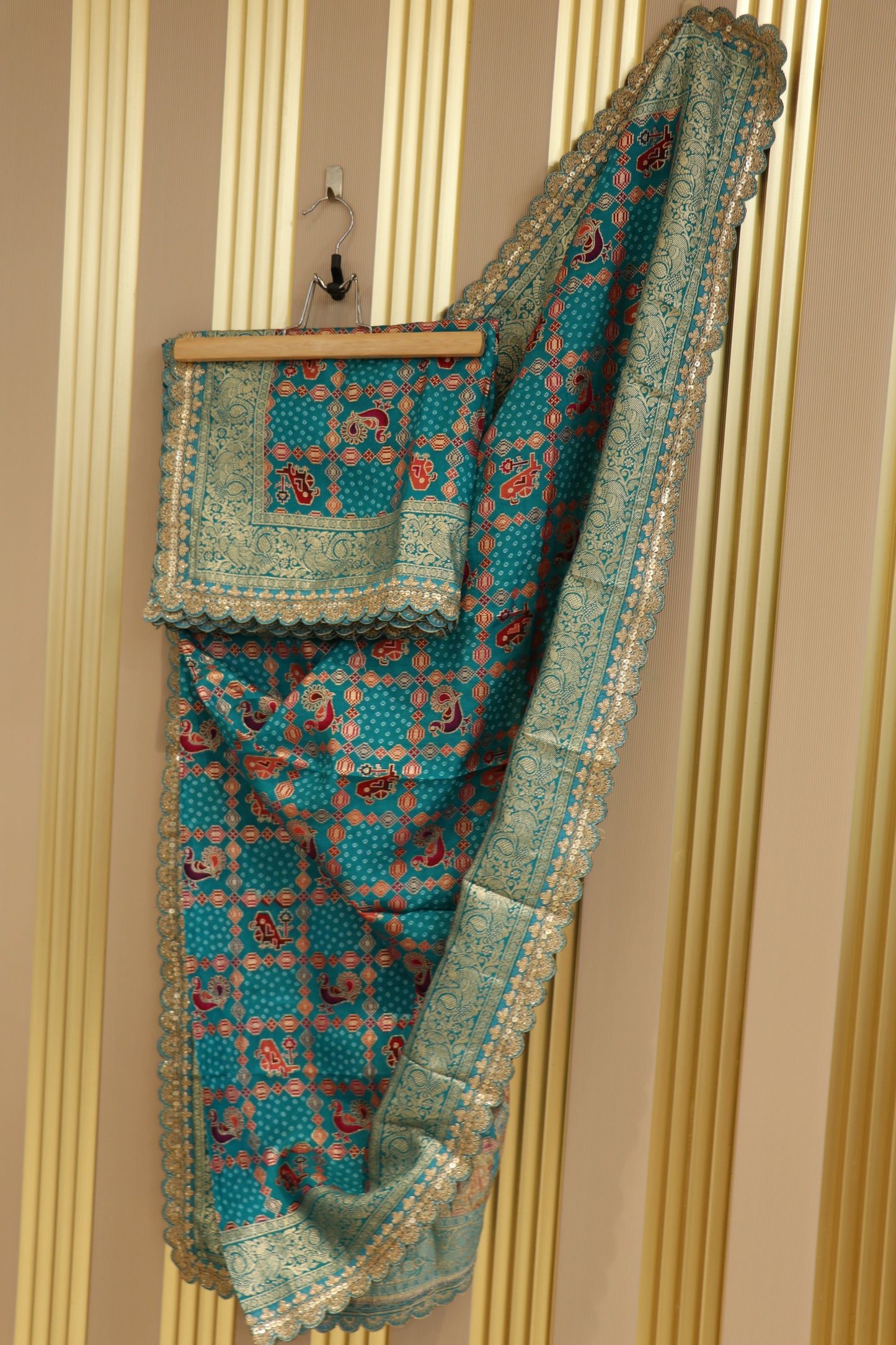 Dola silk semi patola banarasi woven with cutwork border.