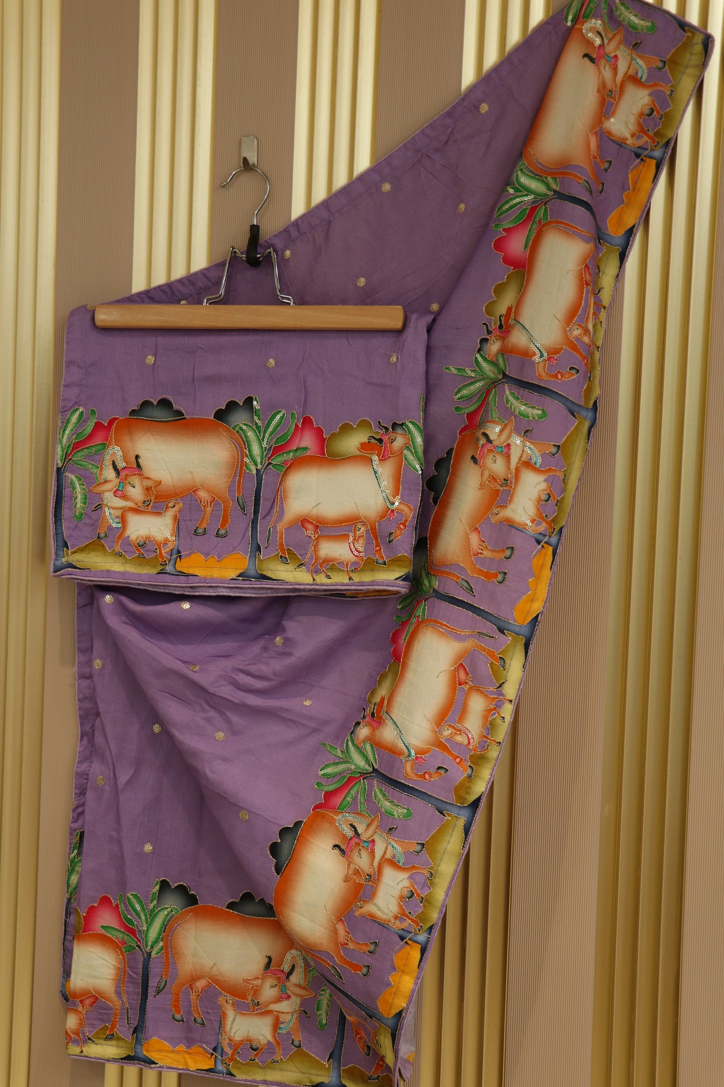 Dola silk dupatta with pitchwai prints,zari and sequins highlighted
