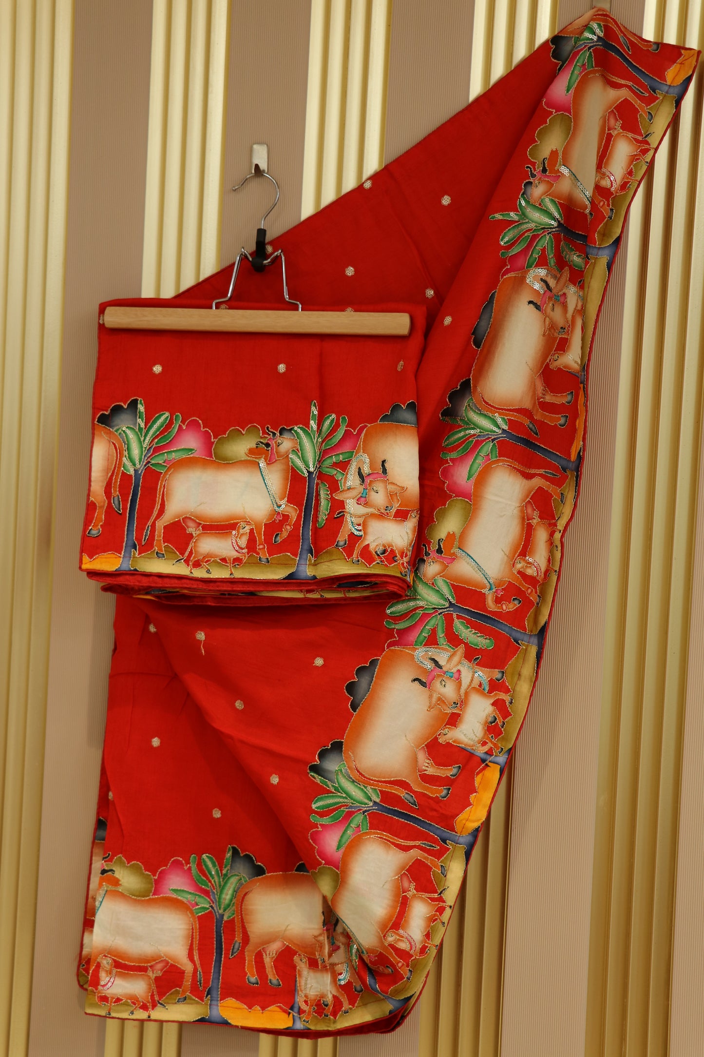 Dola silk dupatta with pitchwai prints,zari and sequins highlighted