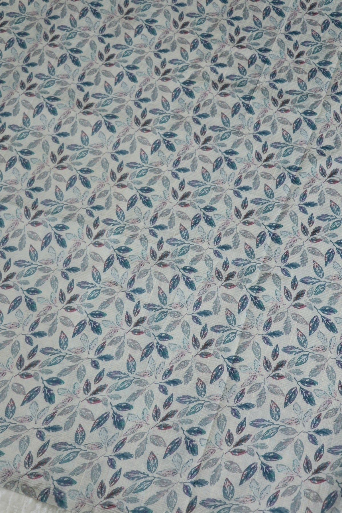 Pure Raw Silk Embossed Leaf Printed Fabric With Blue Hues