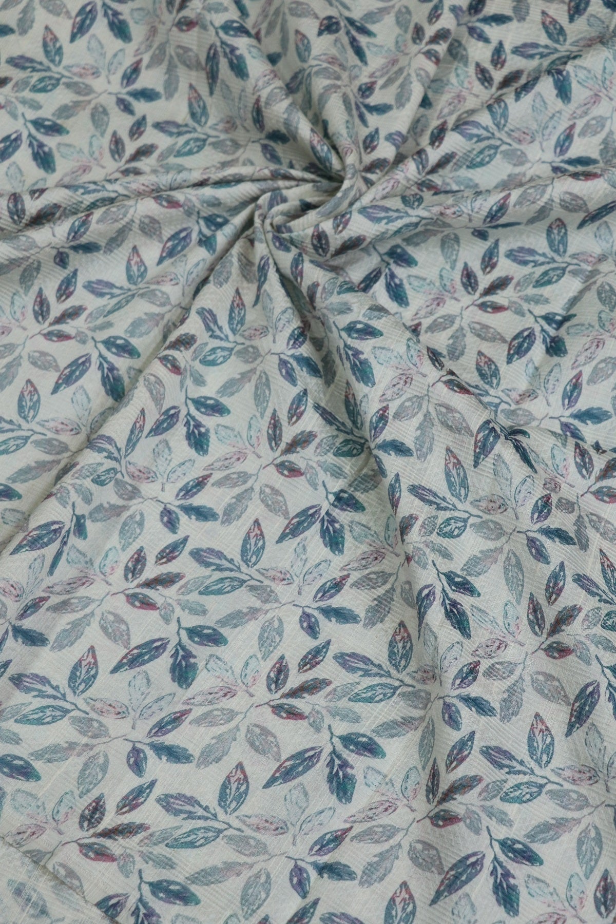 Pure Raw Silk Embossed Leaf Printed Fabric With Blue Hues