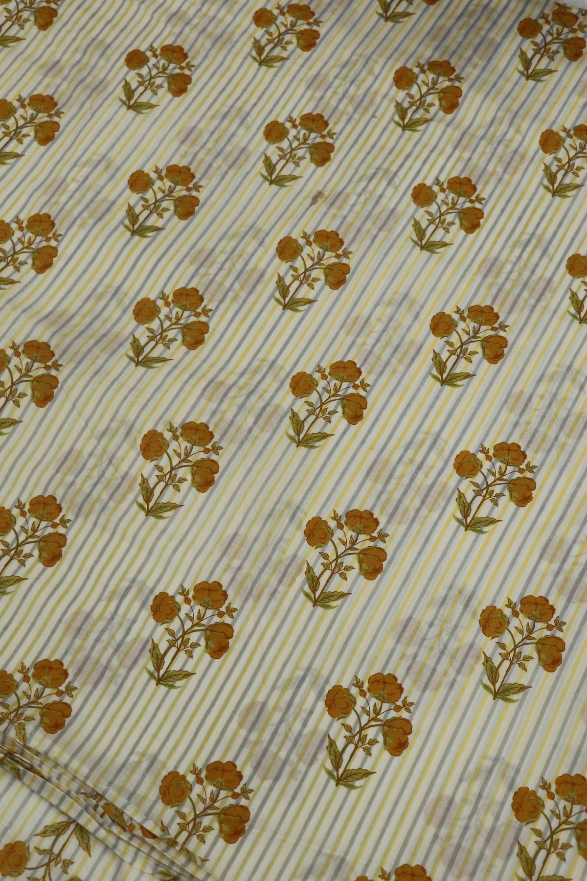 Off White Stripes Jaipur Cotton Fabric With Yellow Floral Bunches