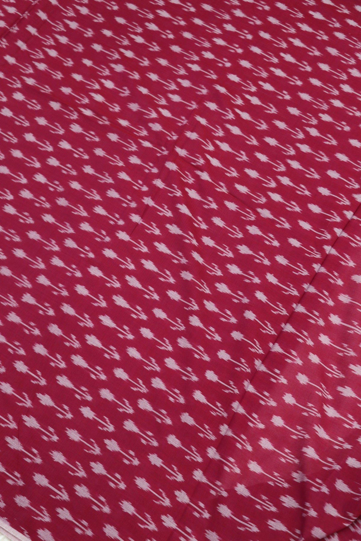 Fiery Rose Pink Mercerised Ikkat With White Woven Designed Fabric