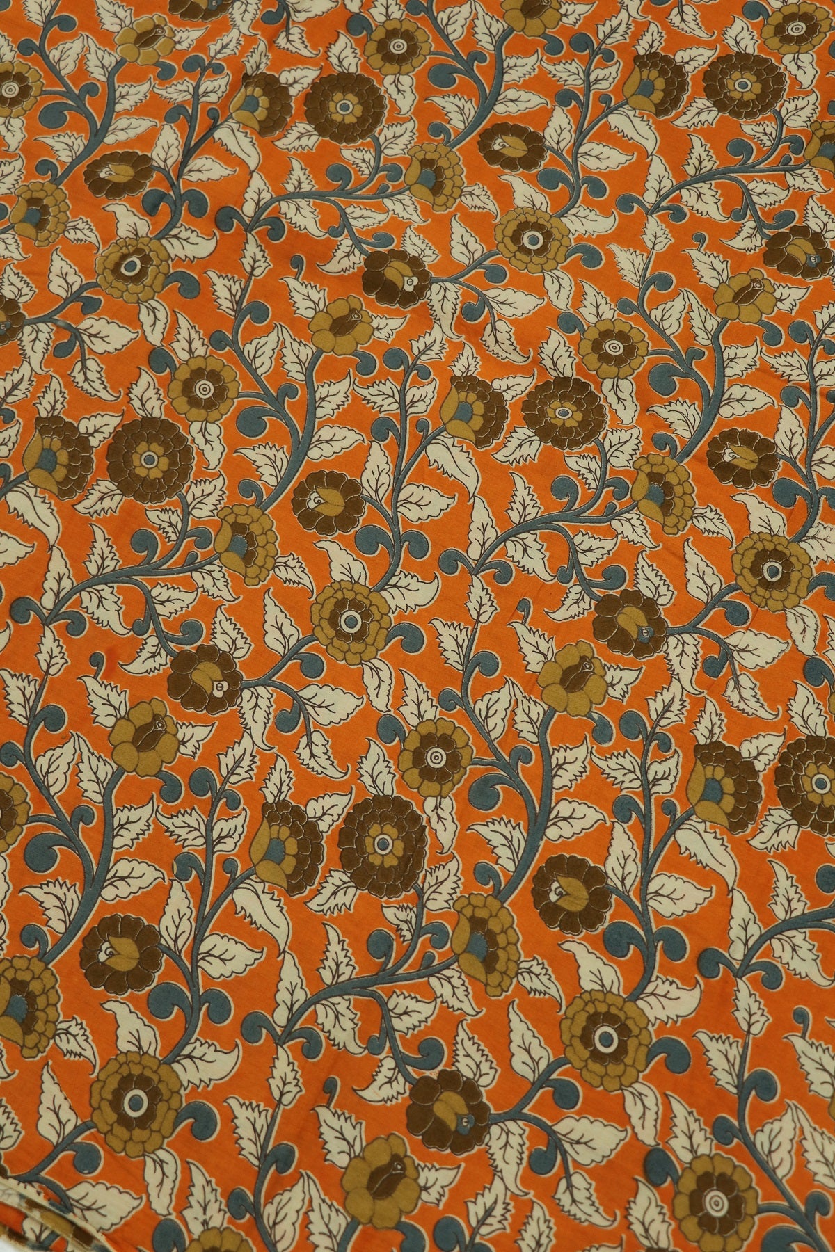 Light Orange Cotton Kalamkari Printed Floral Fabric With Hues Of Blue,browns & Offwhite