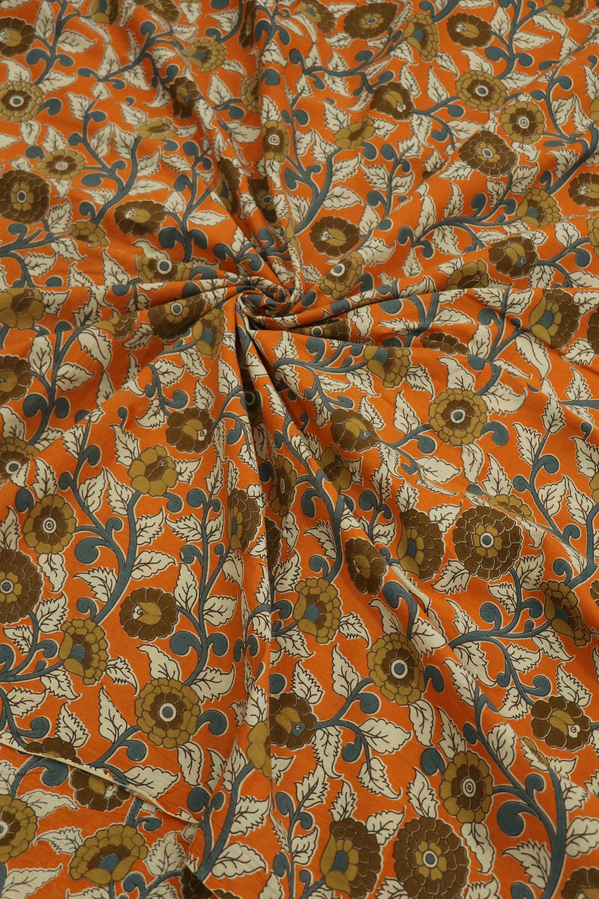 Light Orange Cotton Kalamkari Printed Floral Fabric With Hues Of Blue,browns & Offwhite