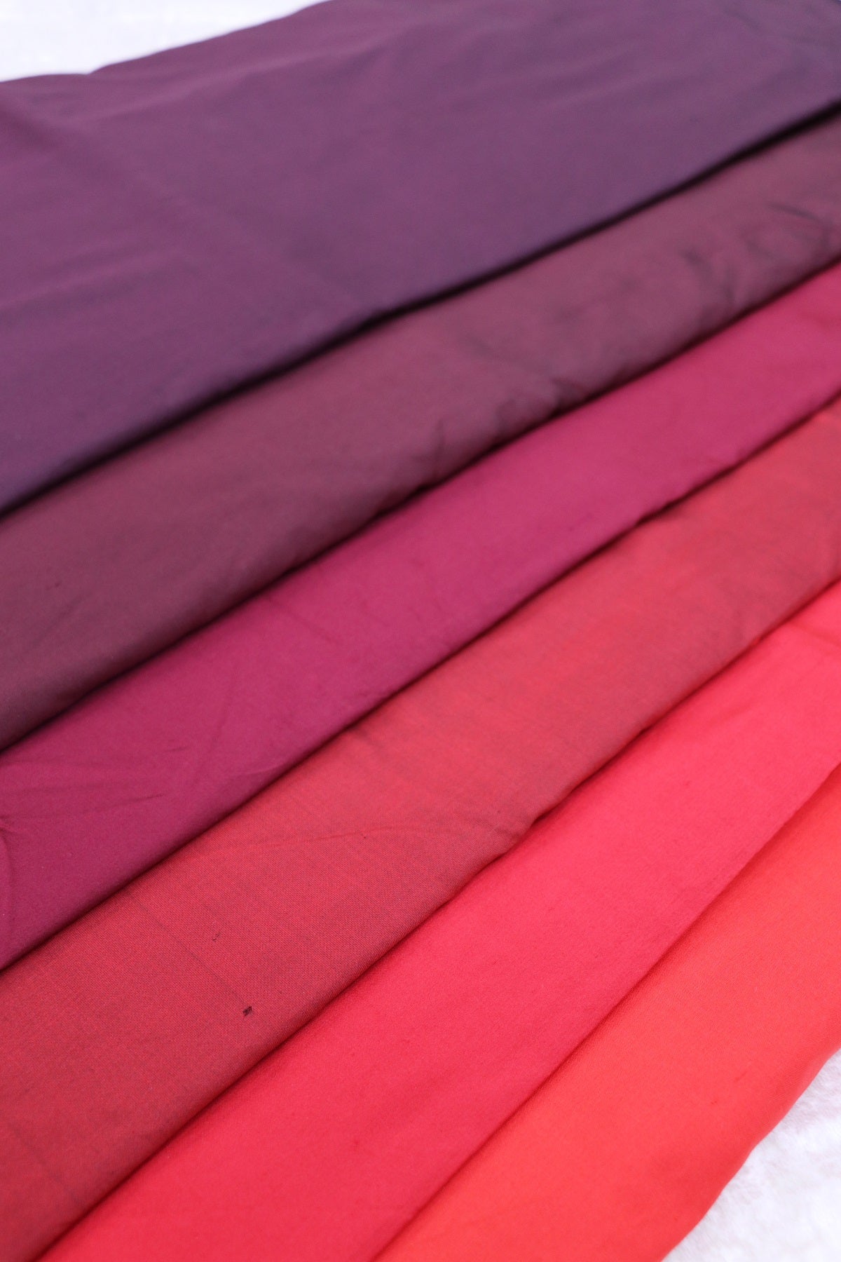 Hues Of Reds Pure Pattu fabric