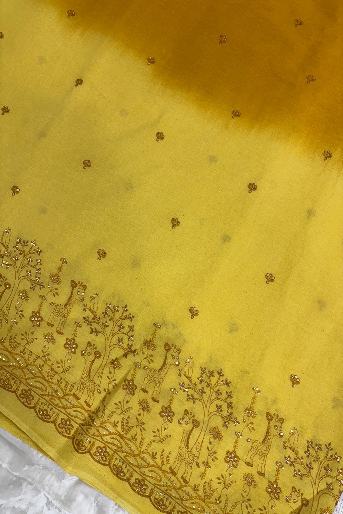 Hues Of Yellow Jungle Theme Embroiderey With Scallop Border Highligted With Sequins Kora Cotton Fabric