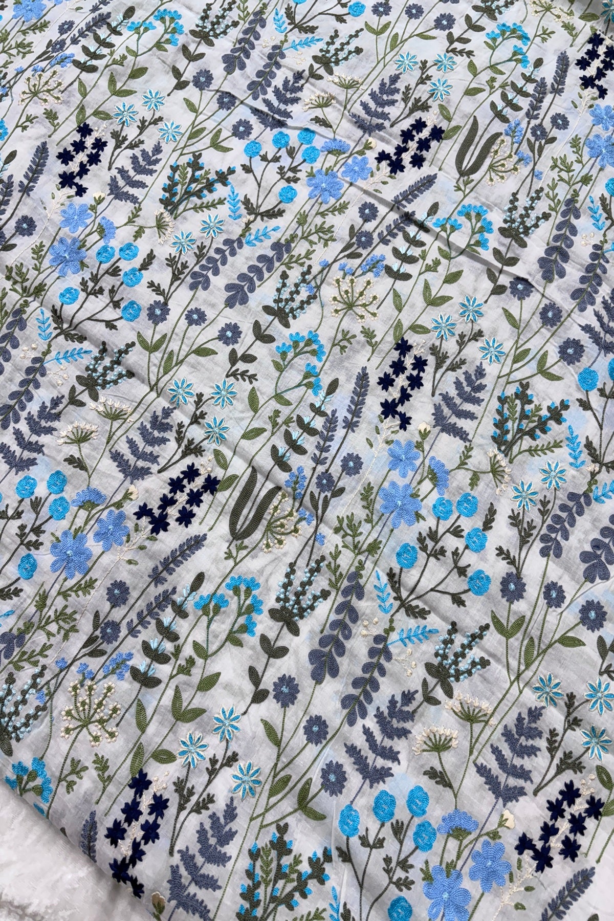 Flora & Fauna Theme Blue Multicolored Threads Embroidered Mul Cotton fabric