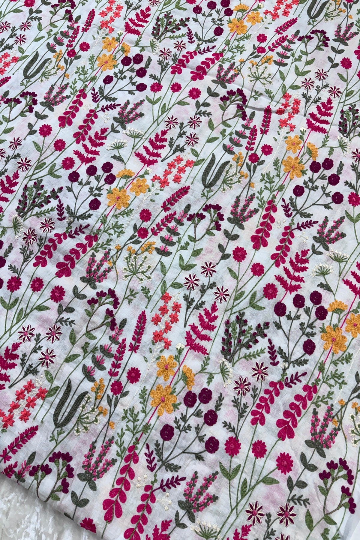 Flora & Fauna Theme Pink Multicolored Threads Embroidered Mul Cotton fabric