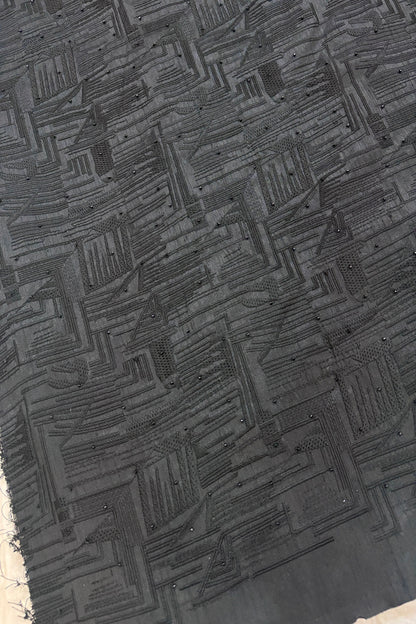 Geometrical Patterns Self Thread Embroidered Semi Raw Silk Fabric