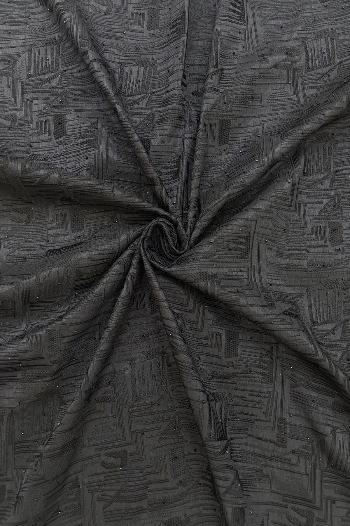 Geometrical Patterns Self Thread Embroidered Semi Raw Silk Fabric