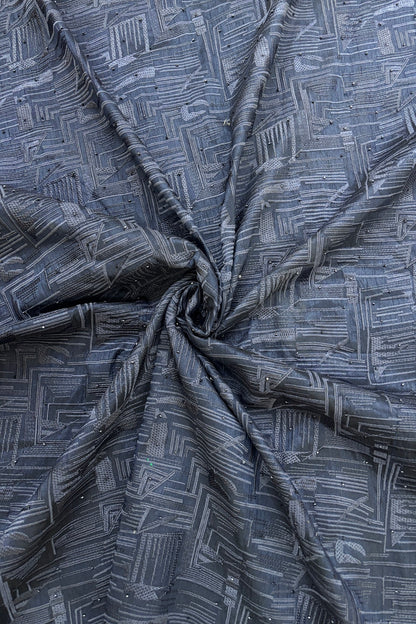 Geometrical Patterns Self Thread Embroidered Semi Raw Silk Fabric