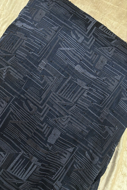 Geometrical Patterns Self Thread Embroidered Semi Raw Silk Fabric