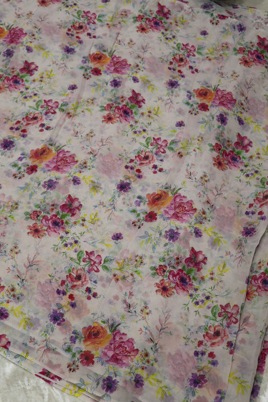 White Printed Georgette Fabric With Hues Of Pink & Oran0ge Flowers
