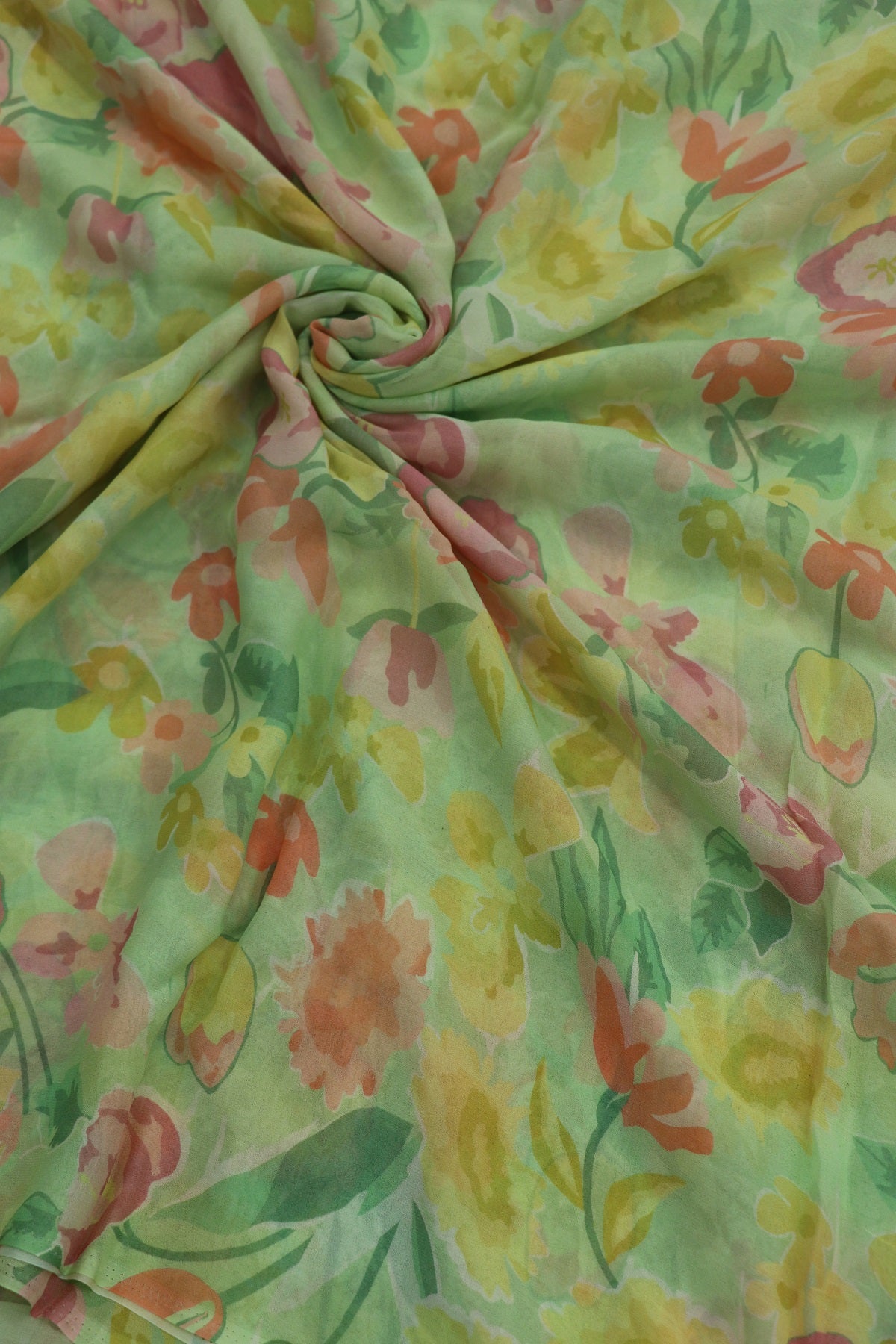 Spring Green With Hues of Peach Pinks Floral Printed Georgette Fabric