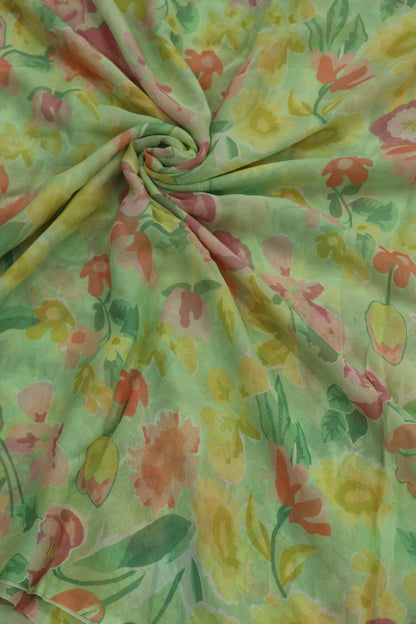 Spring Green With Hues of Peach Pinks Floral Printed Georgette Fabric