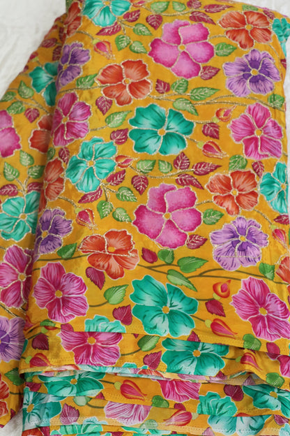 Floral Printed Natural Crepe Fabric highlighted With Zari Threads