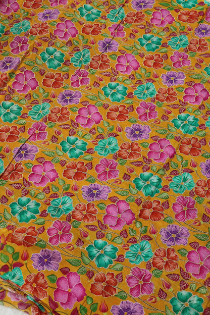 Floral Printed Natural Crepe Fabric highlighted With Zari Threads
