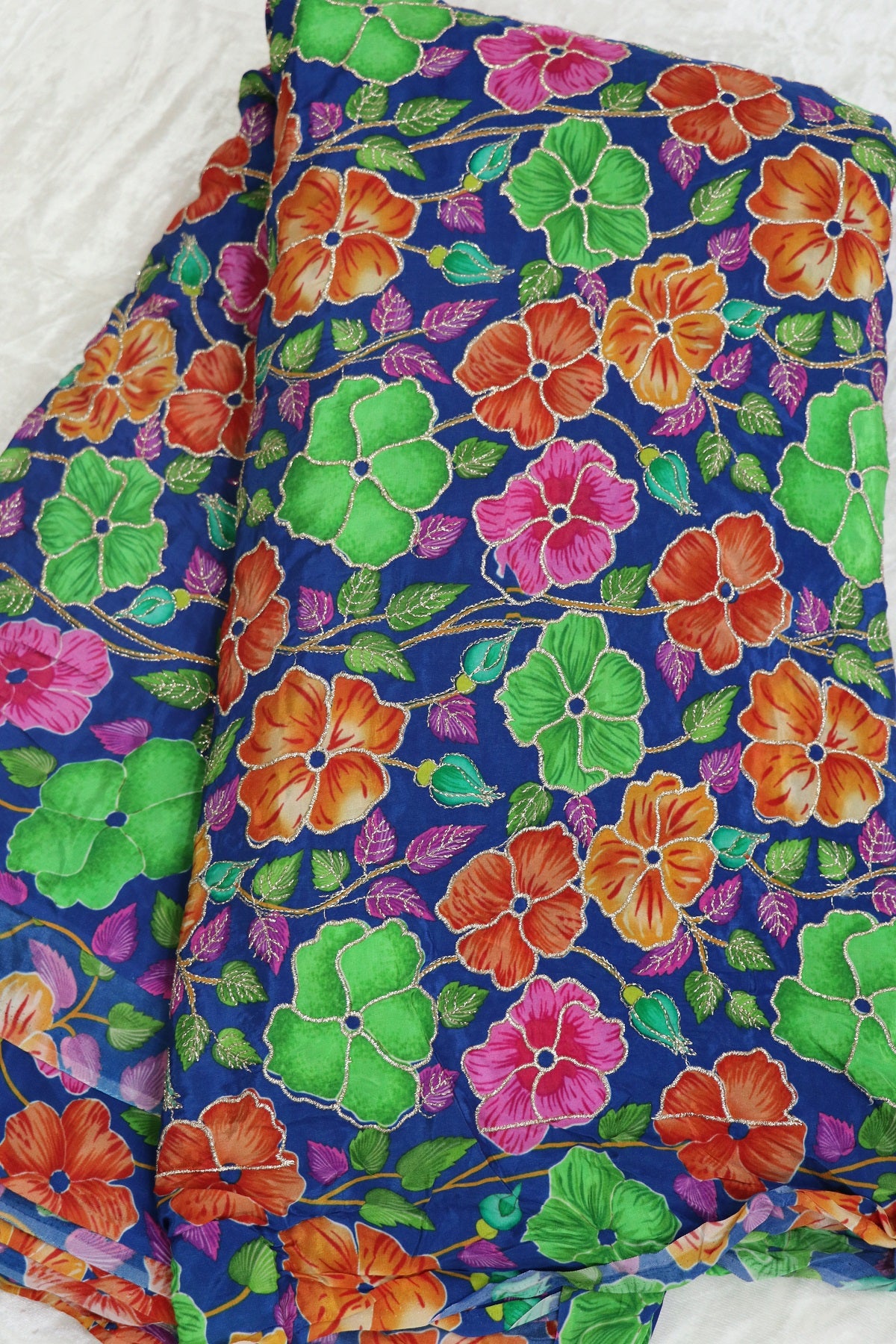 Floral Printed Natural Crepe Fabric highlighted With Zari Threads