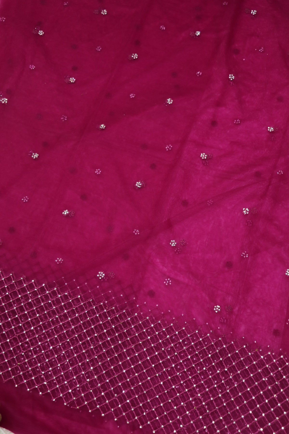 Magenta Pink Net Fabric Highligted With Self Thread worked Border & Chaton Stones