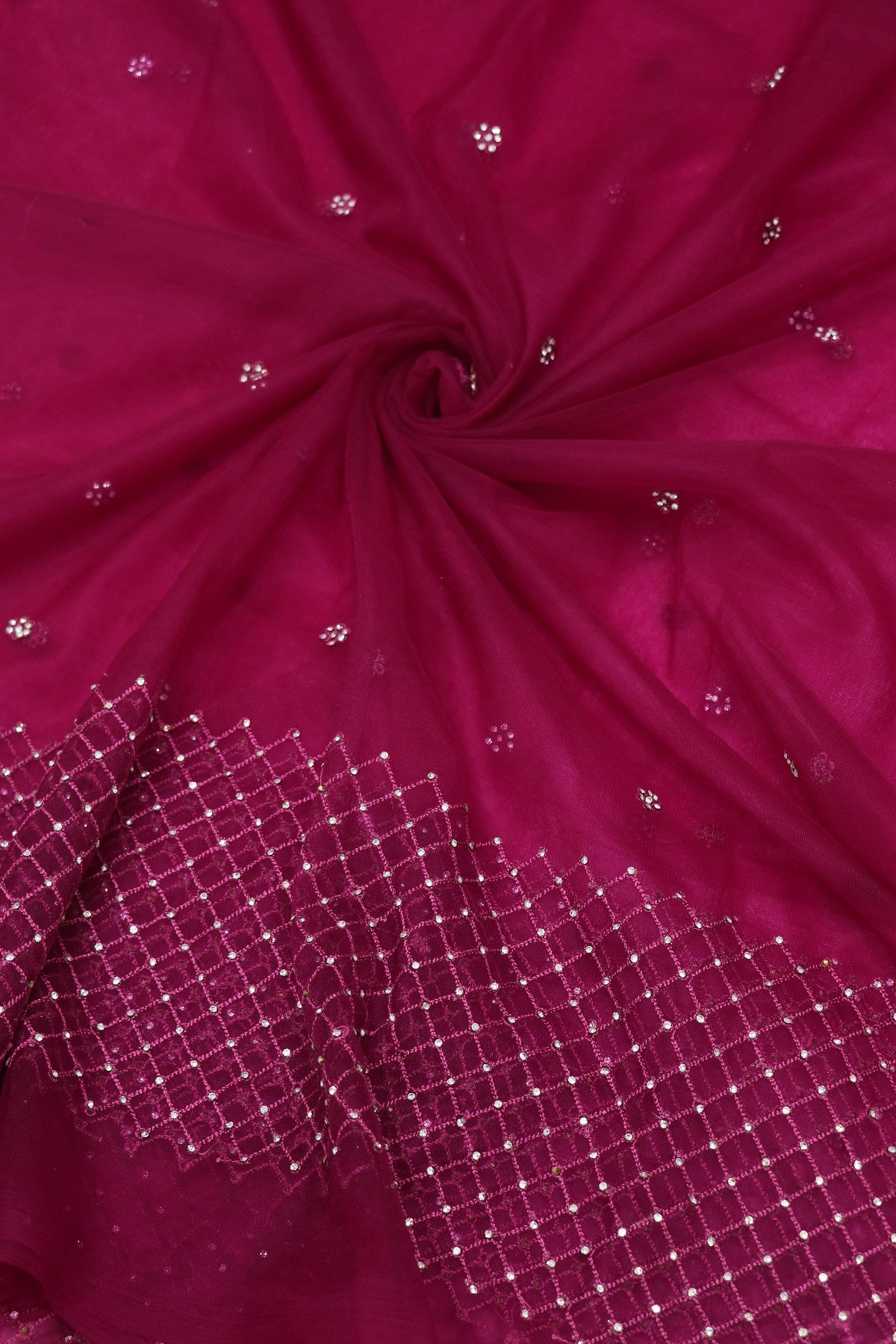 Magenta Pink Net Fabric Highligted With Self Thread worked Border & Chaton Stones
