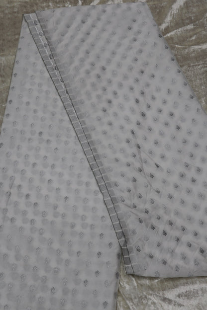 Semi Katan Silk Silver Zari Butties Woven White Dyeable Fabric